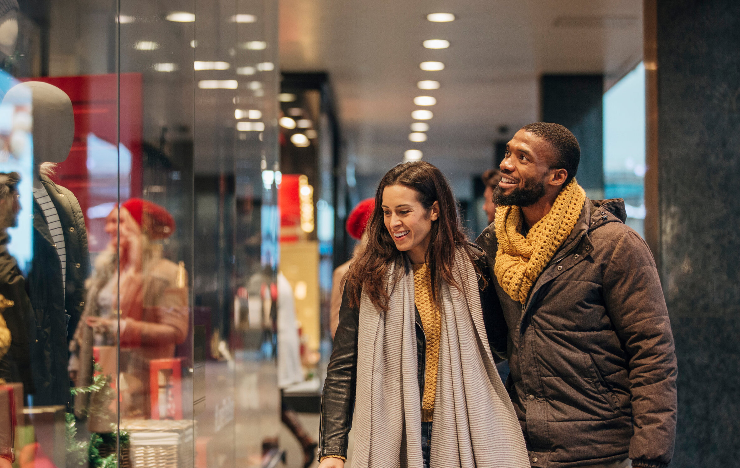 Couple shopping for holiday items.